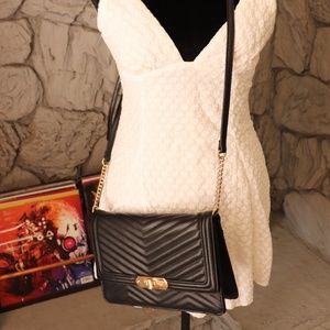 Target black and gold quilted purse